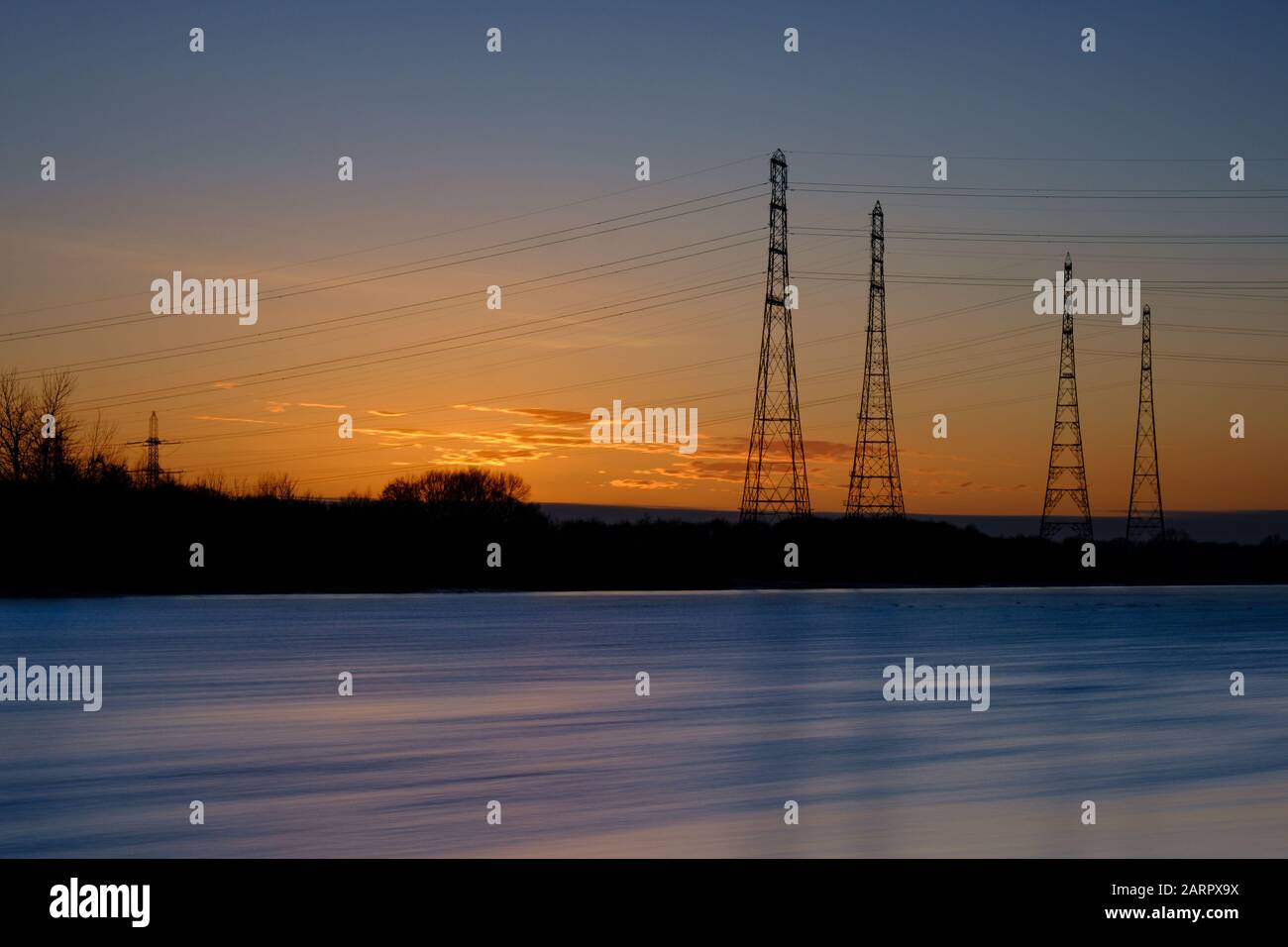 Electricity pylons in water hires stock photography and images Alamy