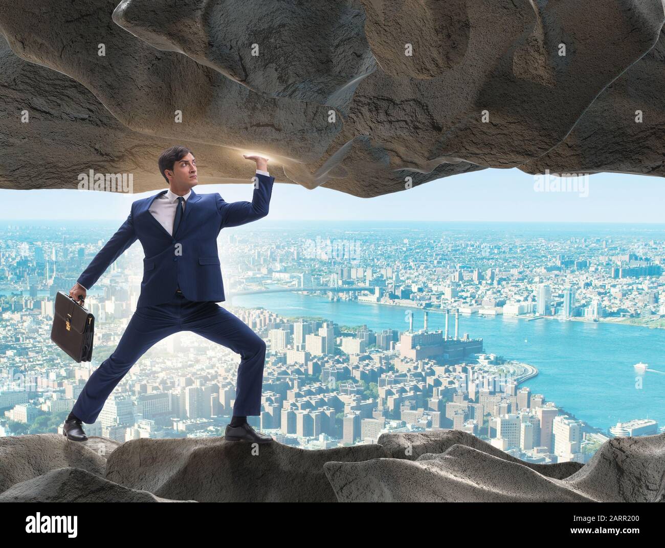 The businessman supporting stone under pressure Stock Photo - Alamy