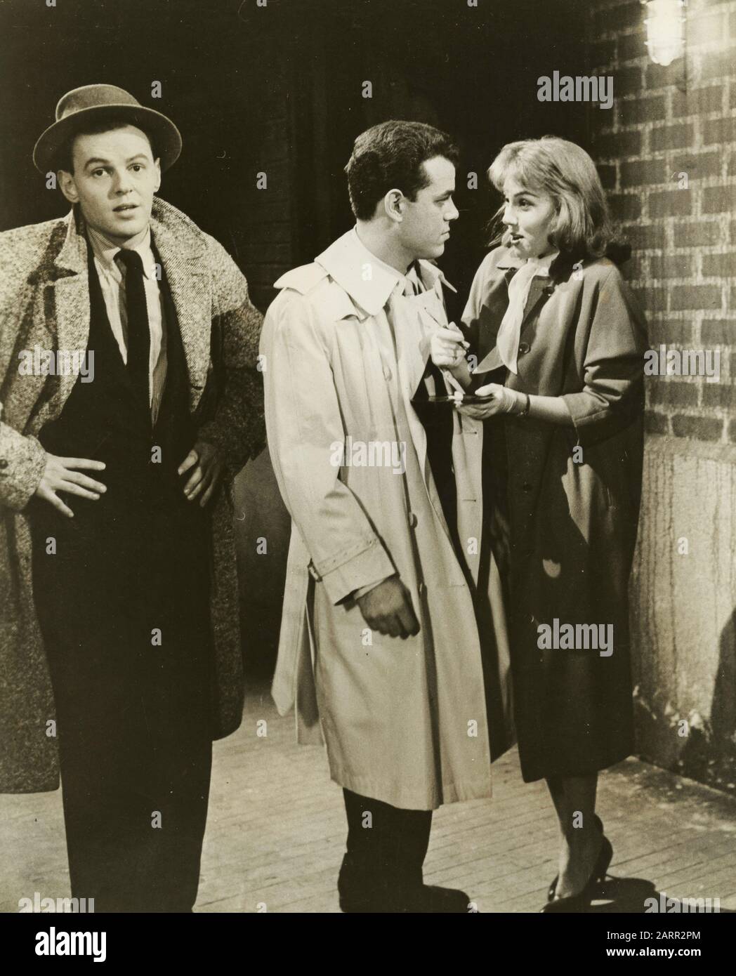 American actors Julius LaRosa, Paul Anka, and Phyllis Newman in the movie Let's Rock, USA 1958 Stock Photo