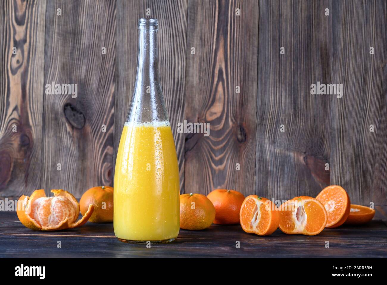 Bottle of orange juice with fresh fruits Stock Photo Alamy