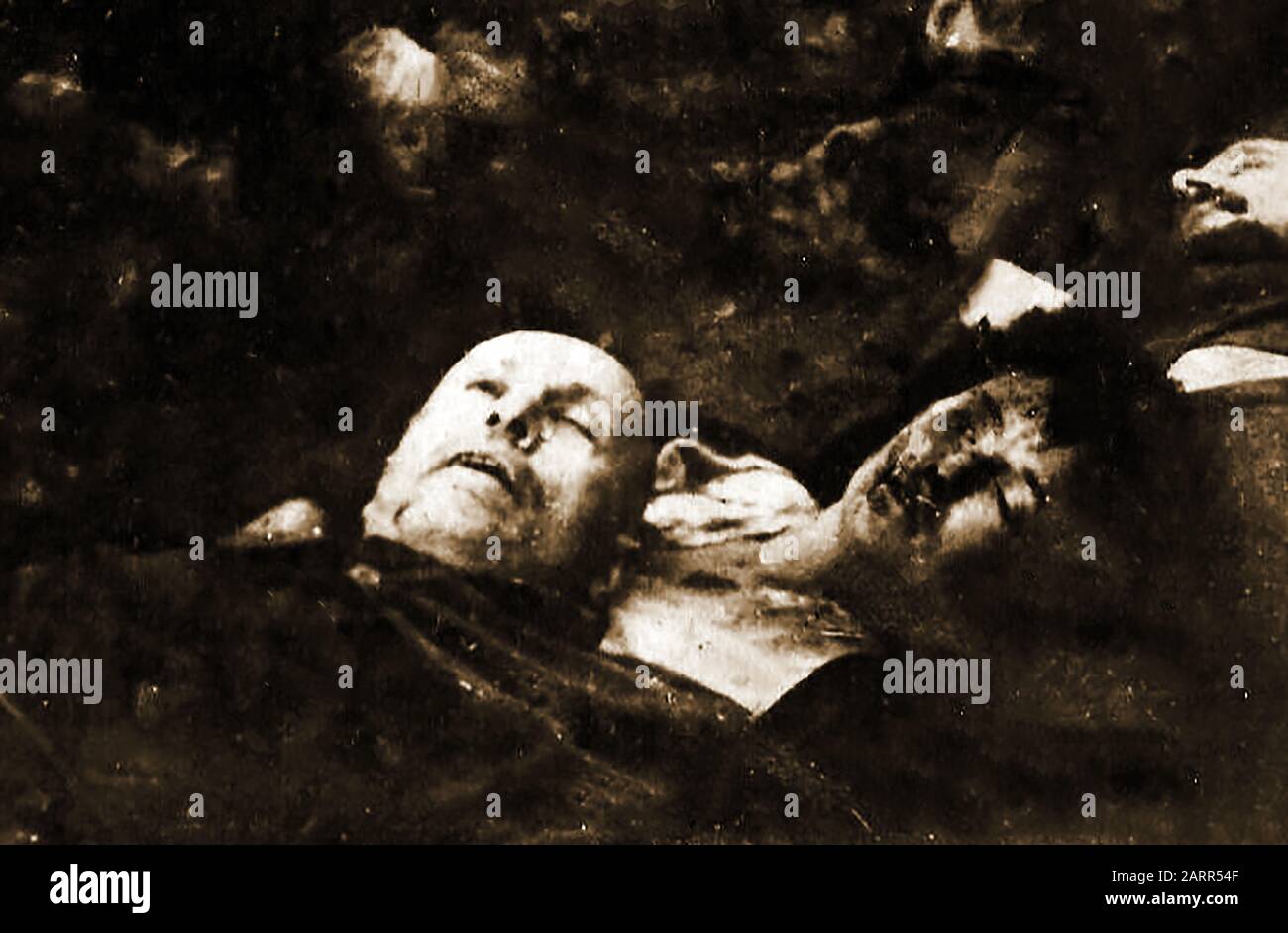 MUSSOLINI -The body of  Mussolini and his mistress Clara Petacci shortly after being shot  -  Benito Amilcare Andrea Mussolini (1883-1945) was a Political Journalist, Prime Minister of Italy, Minister of Foreign Affairs, Duce  of the Italian Social Republic , Dictator & leader of the National Fascist Party.  He and his mistress  Clara Petacci , and followers were summarily shot after being captured by partisans and were taken to Milan where their bodies were kicked, mutilated and hung upside down. Stock Photo