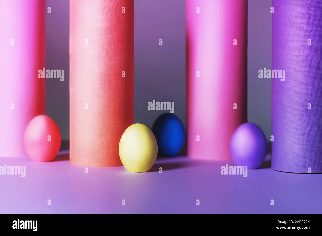 Colored Easter eggs with tubes made from craft paper. Ester concept. Stock Photo