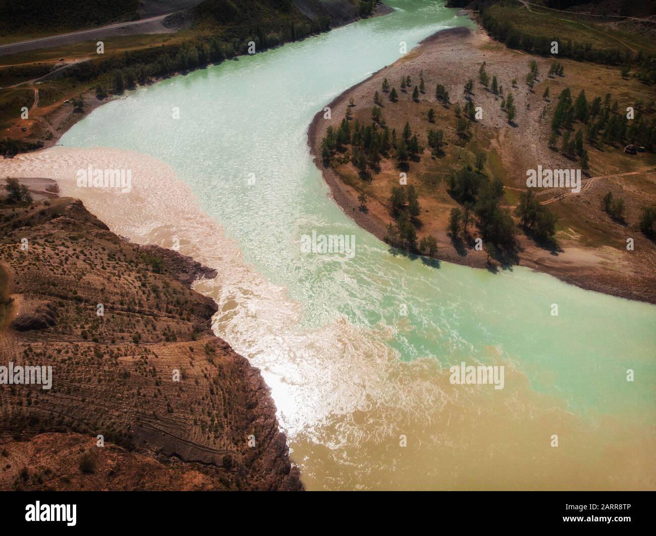 The confluence of two rivers Stock Photo - Alamy