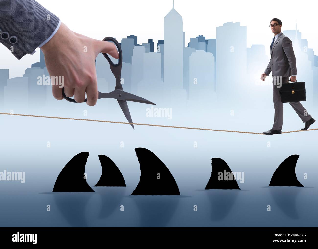 Hand Cutting Rop The hand cutting rope in business risk concept Stock Photo - Alamy