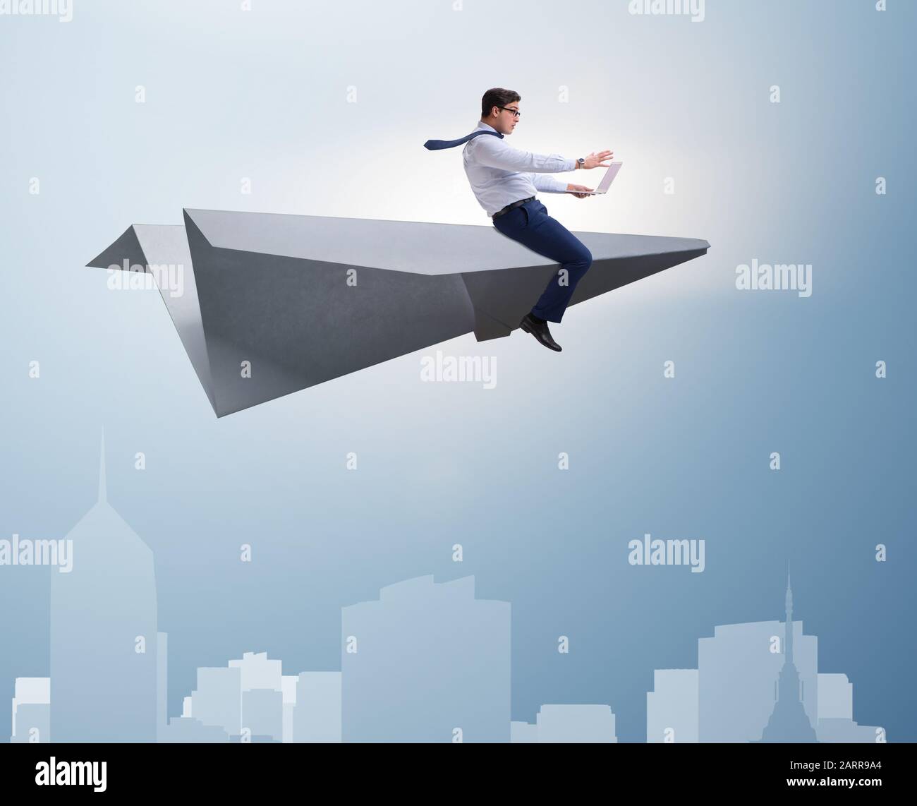 The businessman flying on paper plane in business concept Stock Photo ...