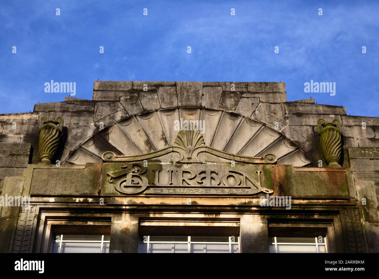 Detail of upper part of facade of former Burton clothes shop, Calverley Road, Tunbridge Wells, Kent, England Stock Photo