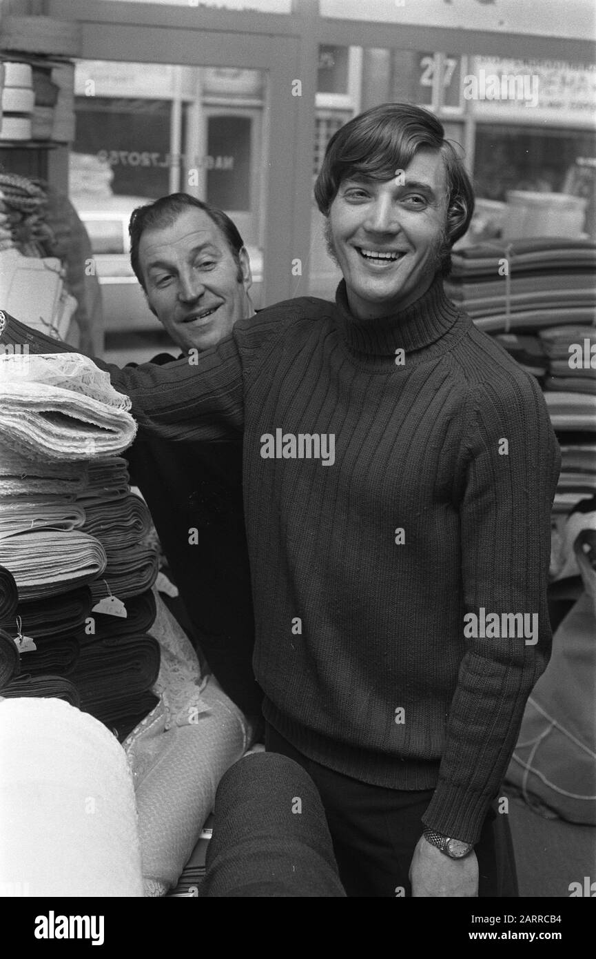 Ruud Krol with father in fabric shop Annotation: Assignment Sport and Sports World. Date: March 18, 1970 Location: Amsterdam Keywords: footballers Personal name: Krol, Ruud Stock Photo