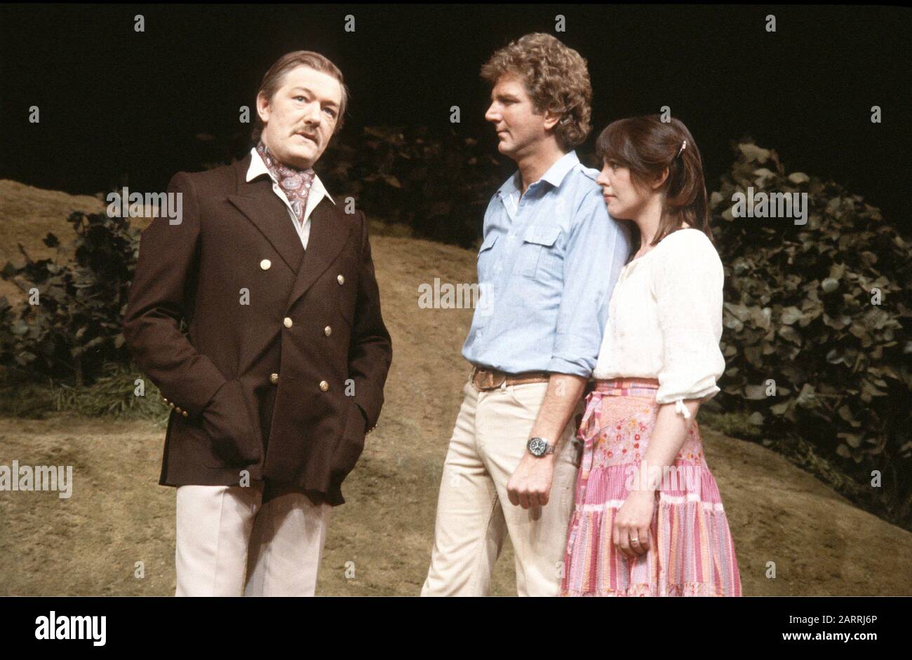 Michael Gambon (as Patrick Smythe), Stephen Moore (as Simon) and Penelope Wilton (as Abigail) in SISTERLY FEELINGS by Alan Ayckbourn directed by Alan Ayckbourn and Christopher Morahan at the National Theatre (NT), London in 1980. Sir Michael Gambon, born in Dublin 1940, moved to London at the age of 6, became a British citizen. Knighted in 1998. Multi-award-winner, including 3 Oliviers and 4 BAFTAs. Stephen Moore, English stage and television actor, born 1937, died 2019. Dame Penelope Wilton, born in Scarborough 1946. English stage, television and film actress. Awarded OBE in 2004 and DBE in 2 Stock Photo