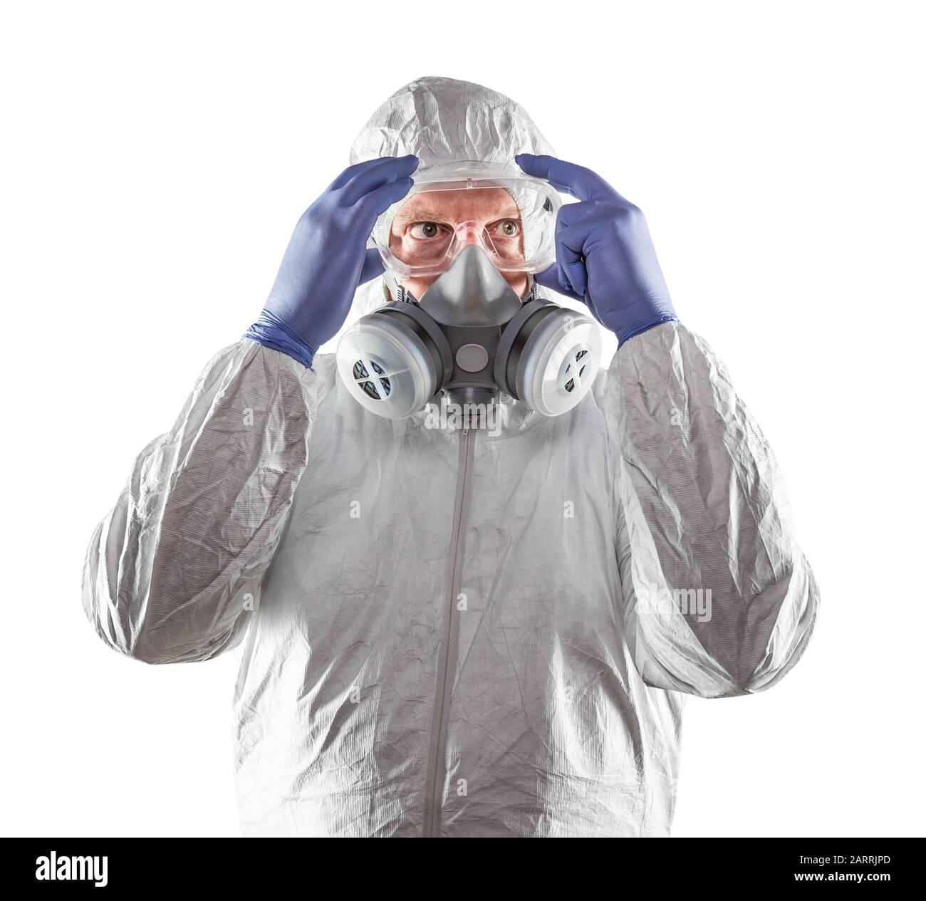Man Wearing Hazmat Suit, Goggles and Gas Mask Isolated On White. Stock Photo