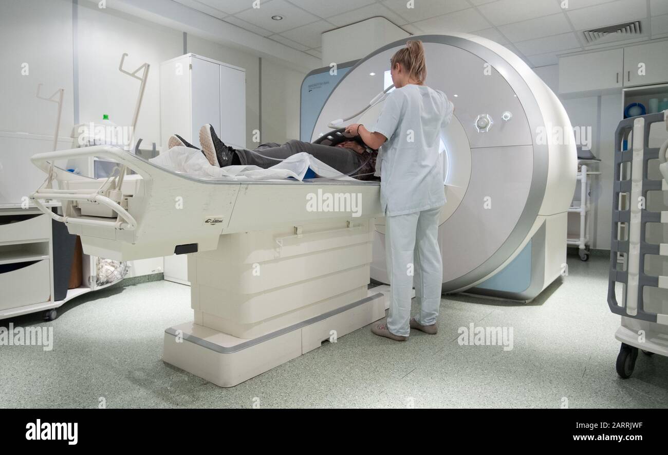 Germany. 20th Jan, 2020. A woman lies in radiology in a