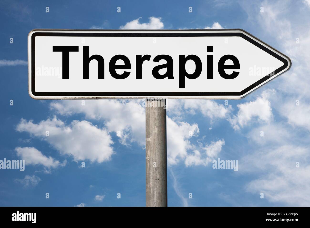 Detail photo of a signpost with the inscription Therapie (Therapy) Stock Photo
