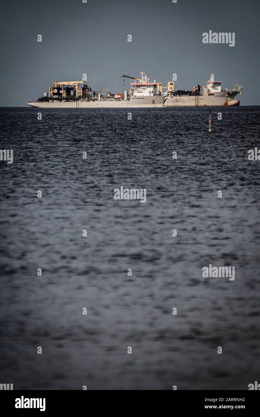 Two cargo ships awaiting on Port of Gdansk roadstead in Gdansk Bay Stock Photo