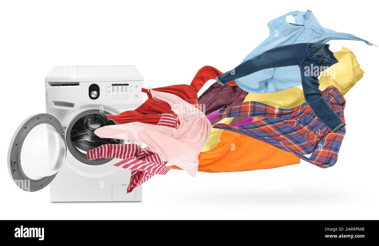Modern washing machine and flying laundry on white background Stock ...