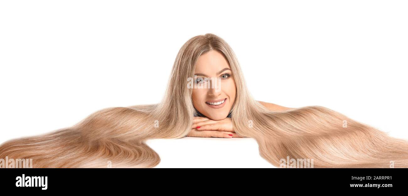 Beautiful young woman with healthy long hair on white background Stock ...