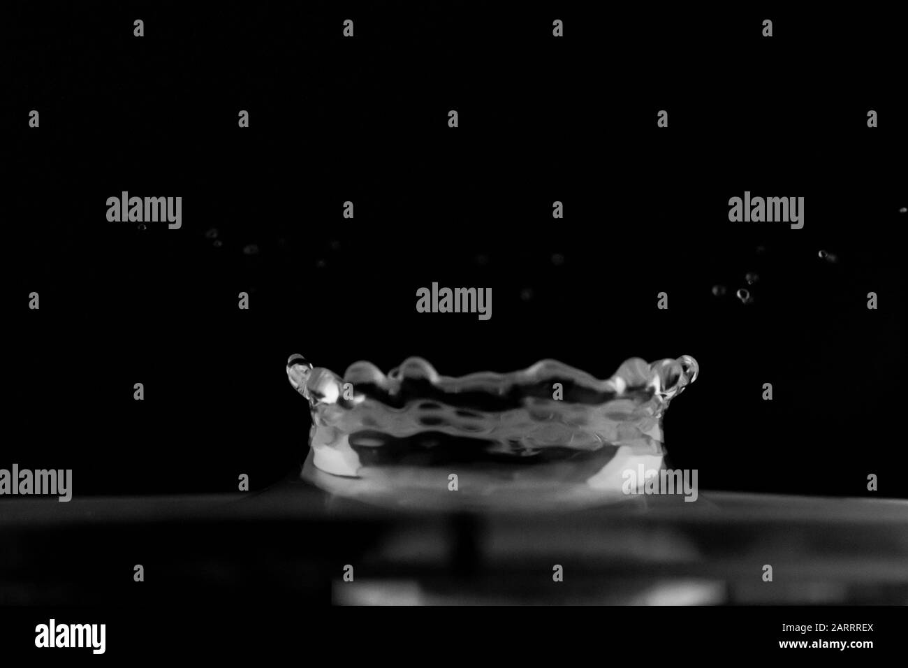 Water splash isolated, water drop hit the surface, water droplet