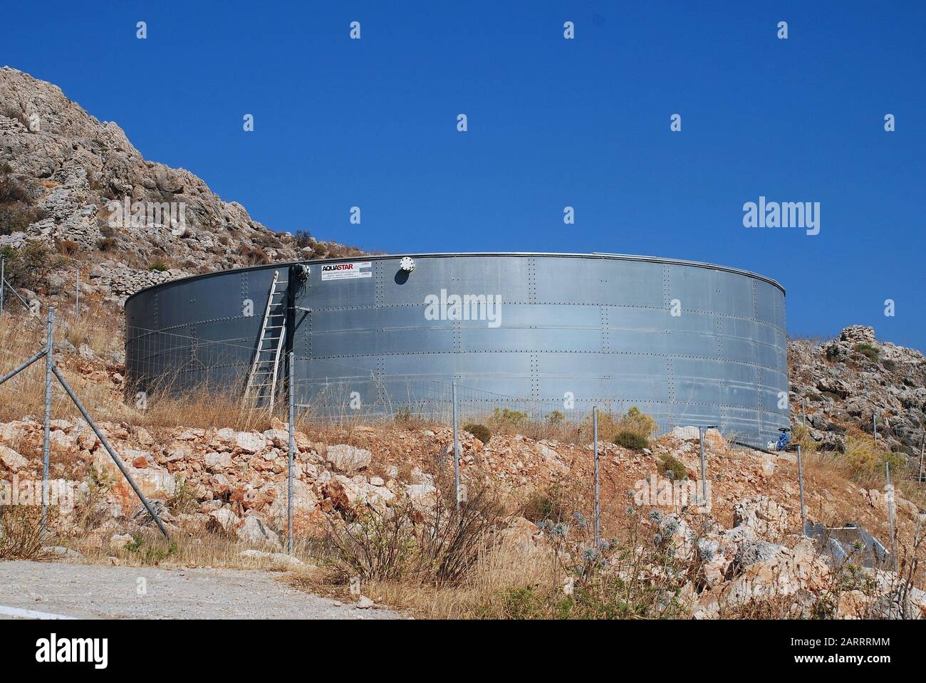 The desalination plant at Emborio on the Greek island of Halki on June 17, 2017. Opened in 2014, it removed the need to ship in water from Rhodes. Stock Photo