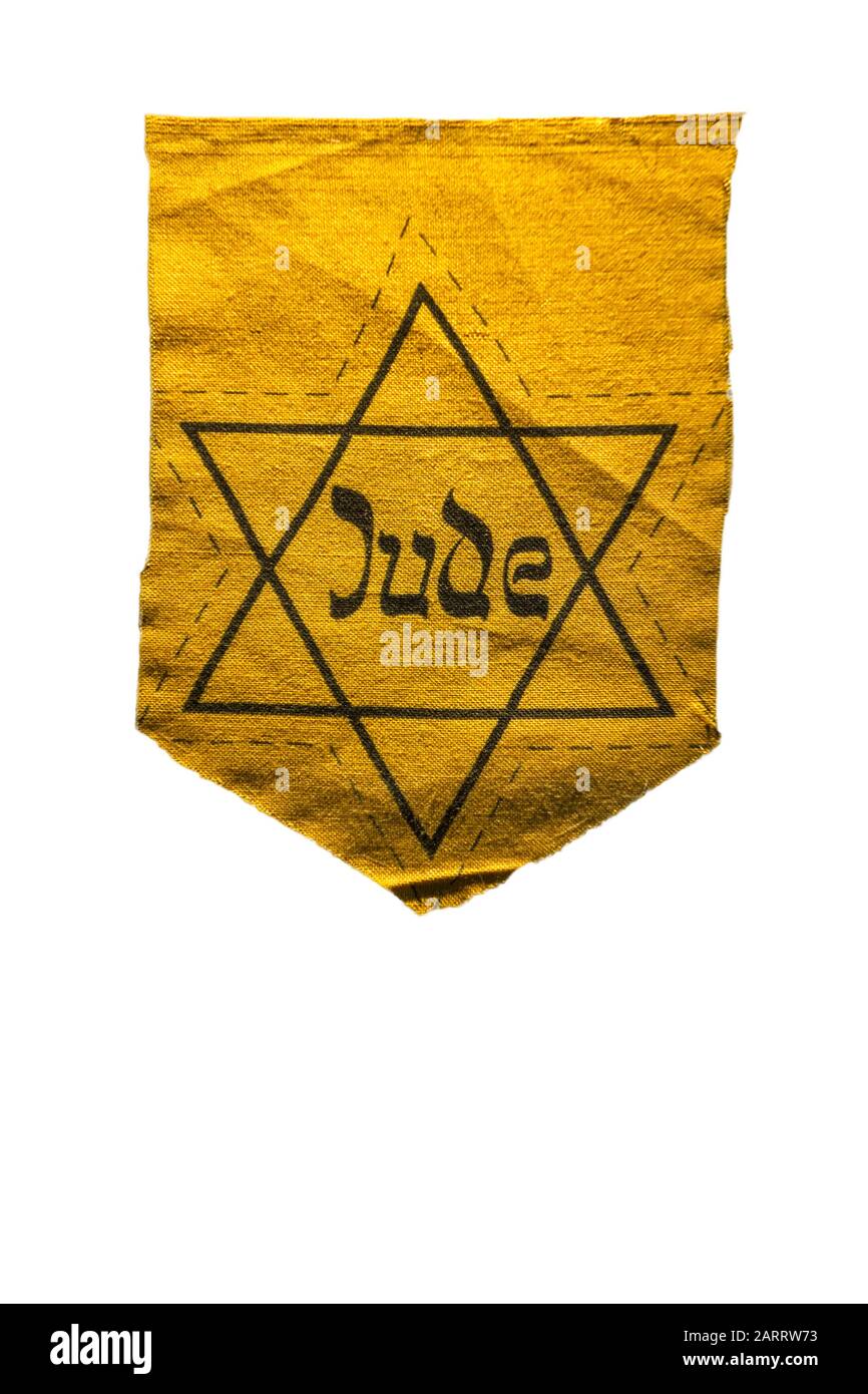 German Jewish badge showing yellow star saying Jude against white background Stock Photo