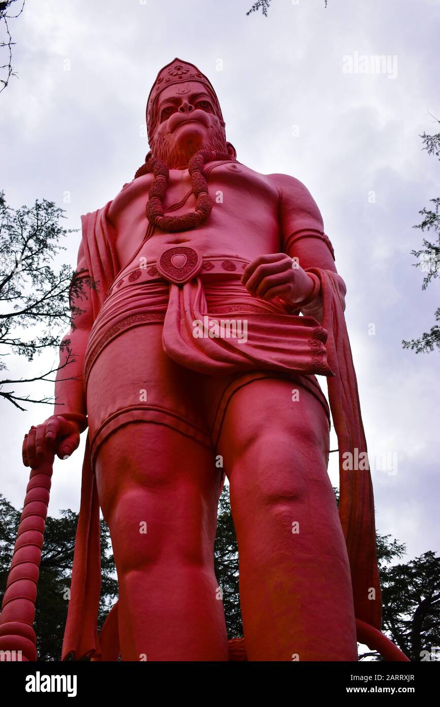 Beautiful Lord Hanuman tall statue at Jakhoo Temple - The 108 ft tall Hanuman Murti is situated at Jakhu Hill near Shimla in Himachal Pradesh. Stock Photo