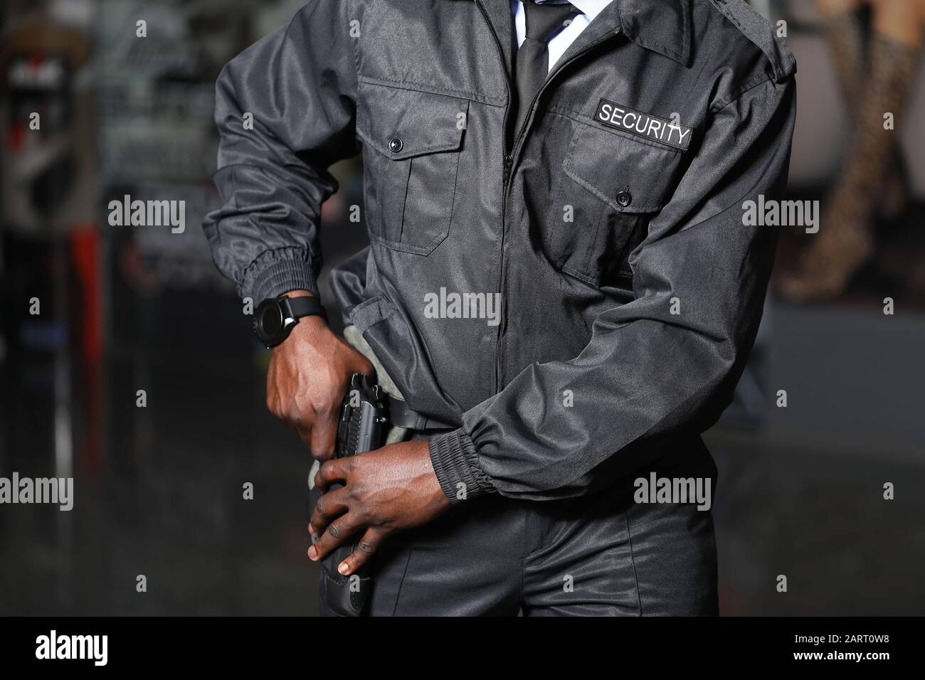 African-American security guard working in building Stock Photo - Alamy
