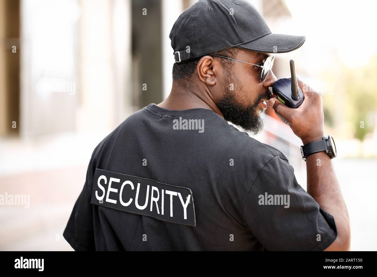 African-American security guard outdoors Stock Photo - Alamy