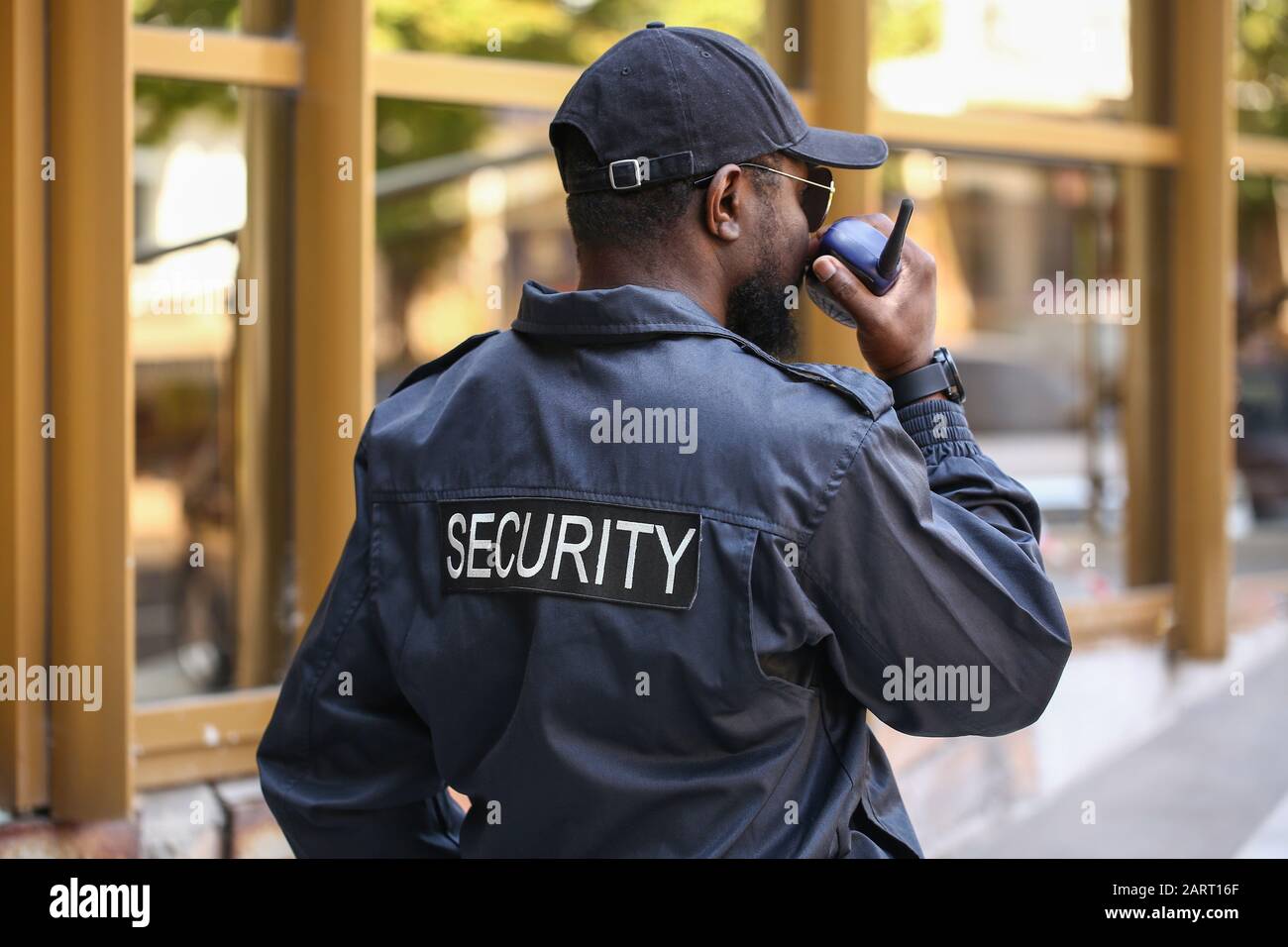 African-American security guard outdoors Stock Photo - Alamy