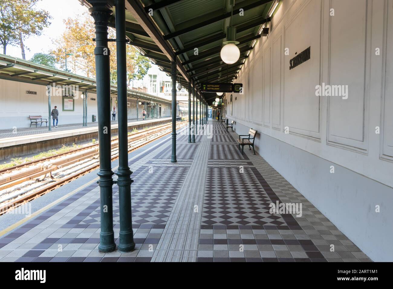 Vienna, Austria - September 3, 2019: People waiting at Schonbrunn tube platform for train arrives Stock Photo