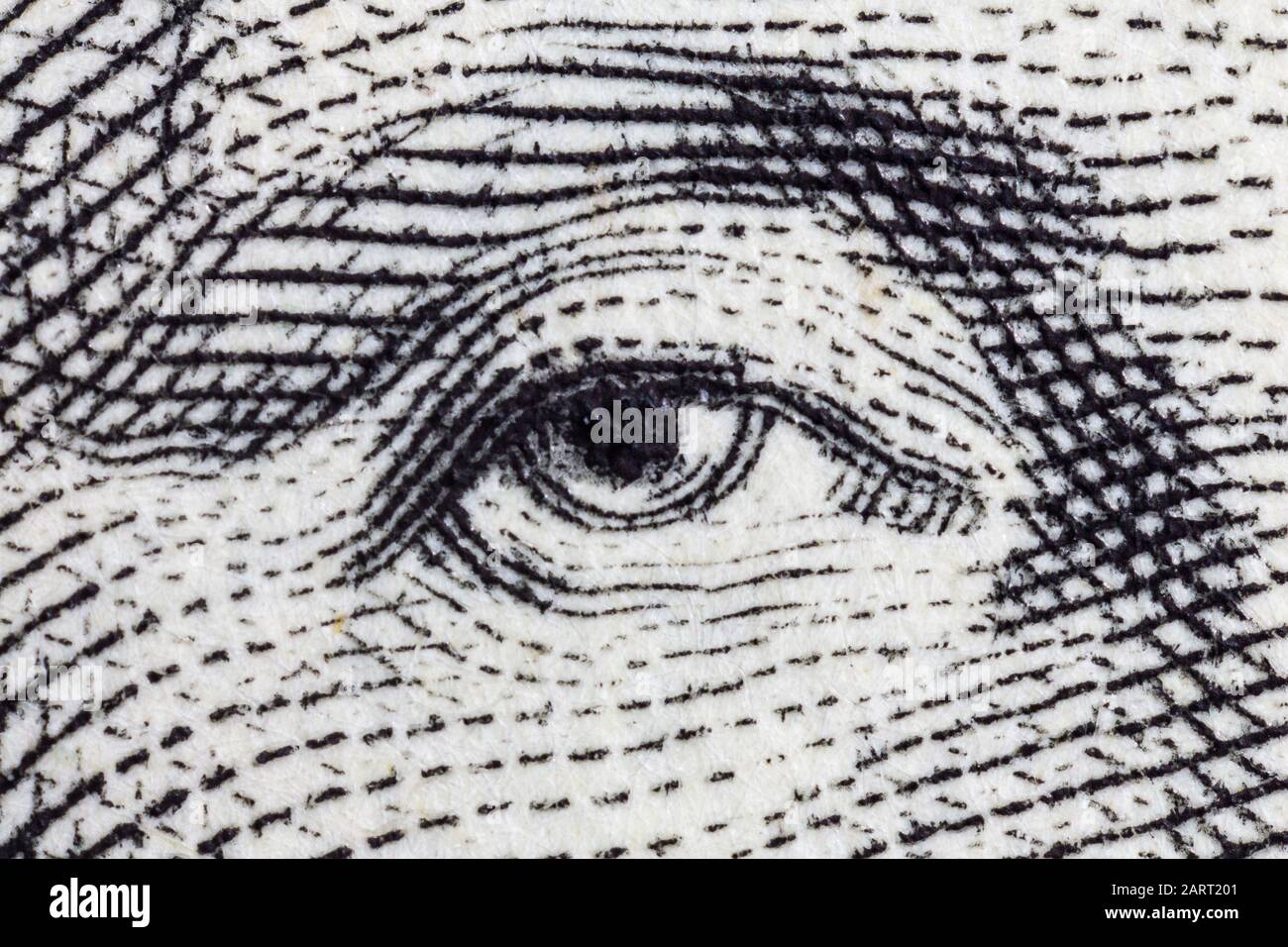 Macro close up photograph of George Washington eye on the US one dollar bill. Stock Photo