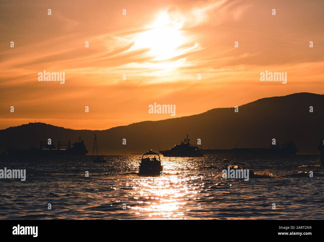 Boats sunset beach Vancouver Stock Photo