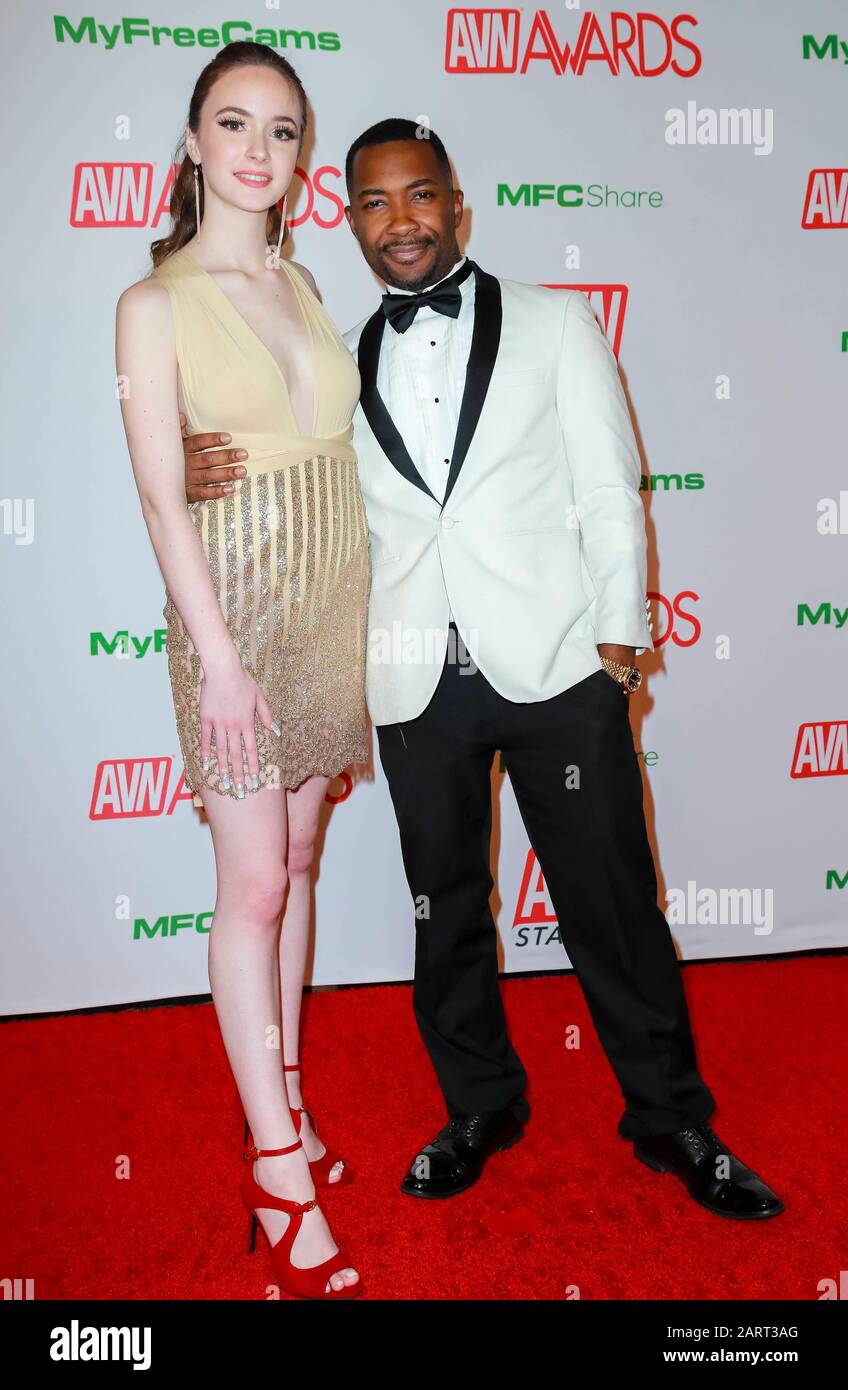 Hazel Moore and Tee Real (r) attend the 2020 Adult Video News AVN