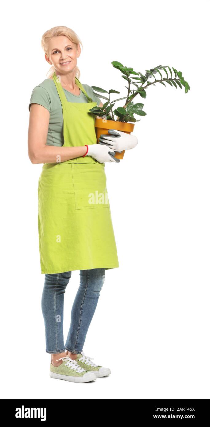 Portrait of female gardener on white background Stock Photo - Alamy