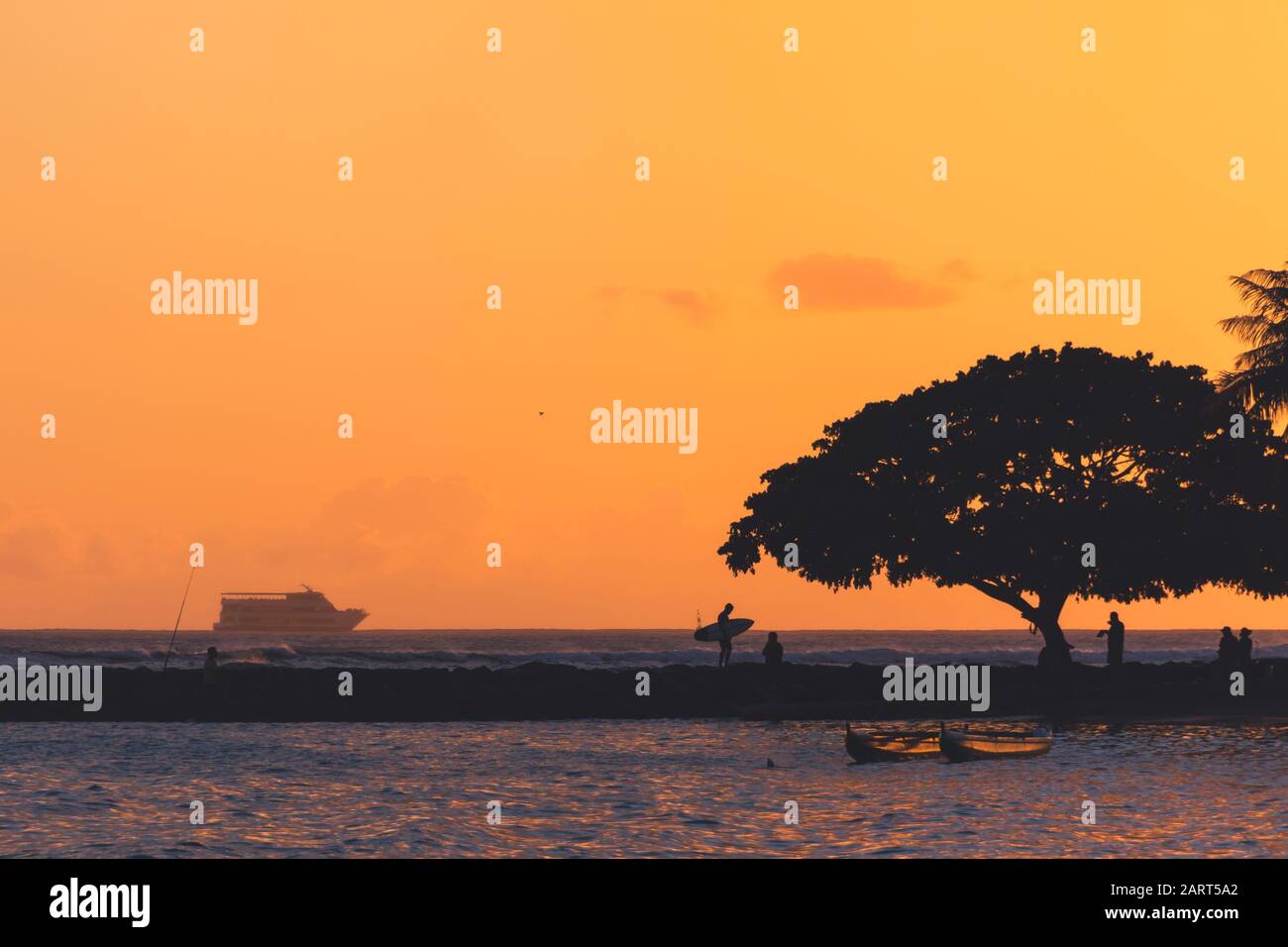 Surfer silhouette Waikiki Stock Photo