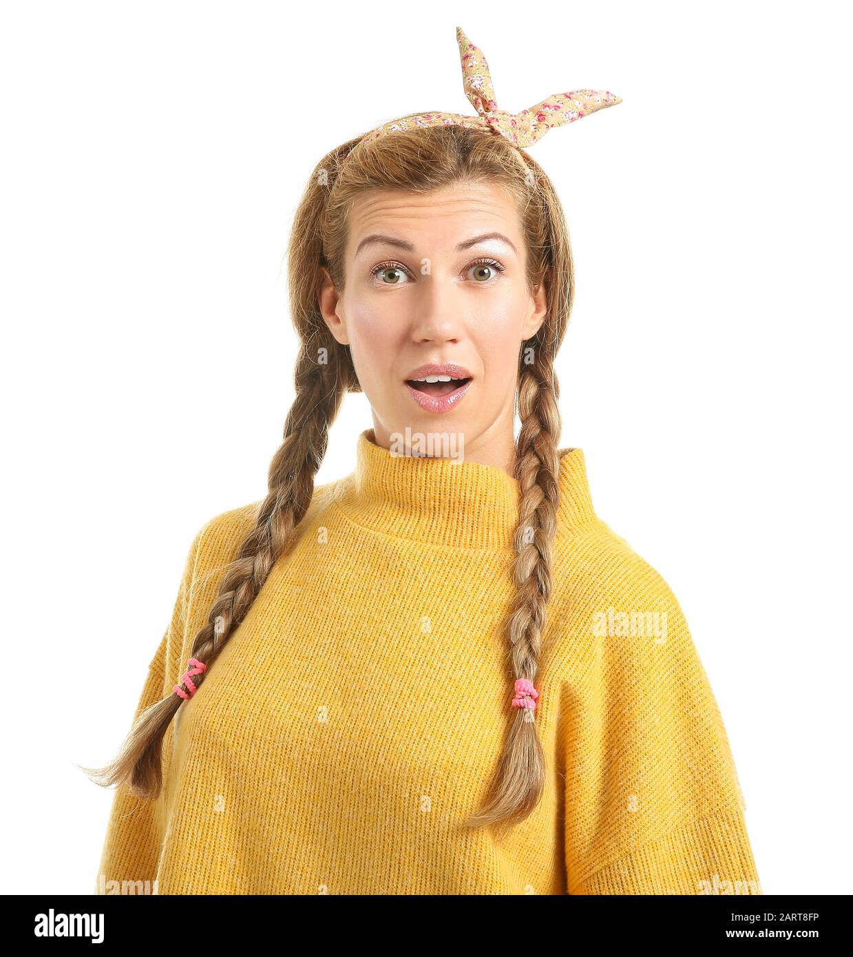 Surprised young woman on white background Stock Photo - Alamy