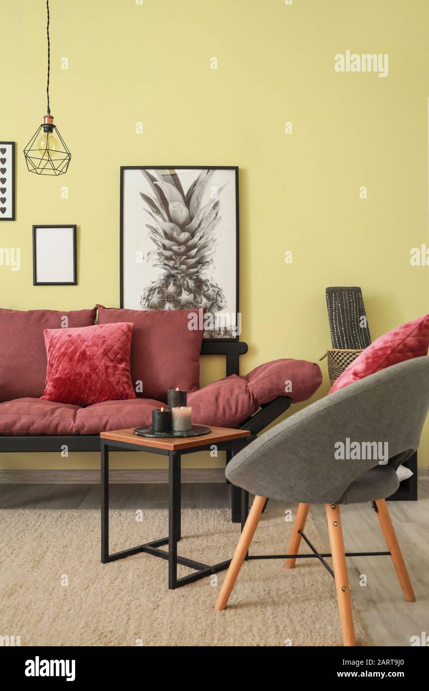 Stylish interior of living room with sofa Stock Photo - Alamy