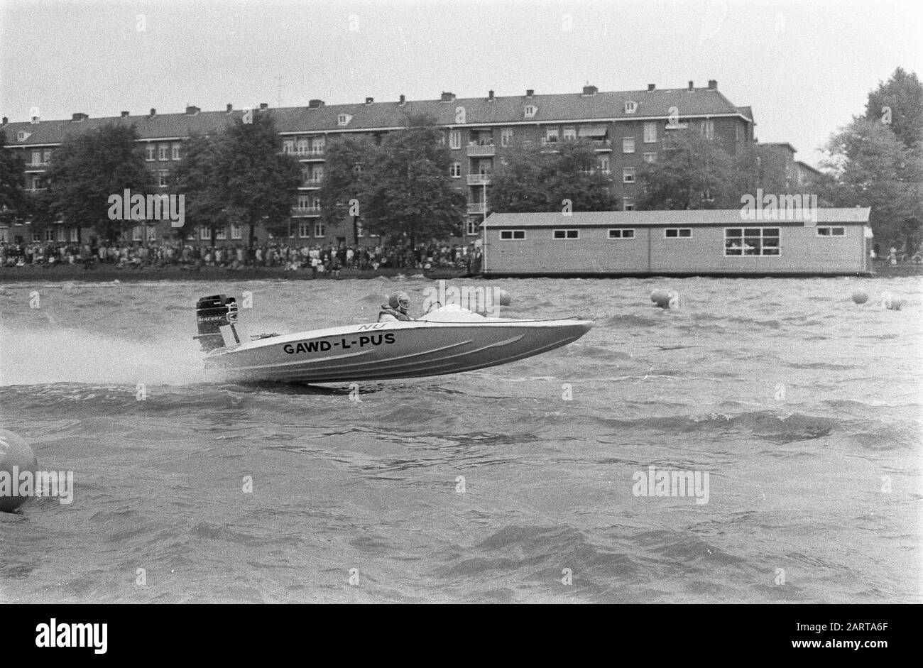 Speedboat races in Amsterdam. The Three Hours of Amsterdam, Don Ross (England) in ak (became first)/Date: September 21, 1969 Location: Amsterdam, Noord-Holland Keywords: speedboats Personal name: Don Ross Stock Photo