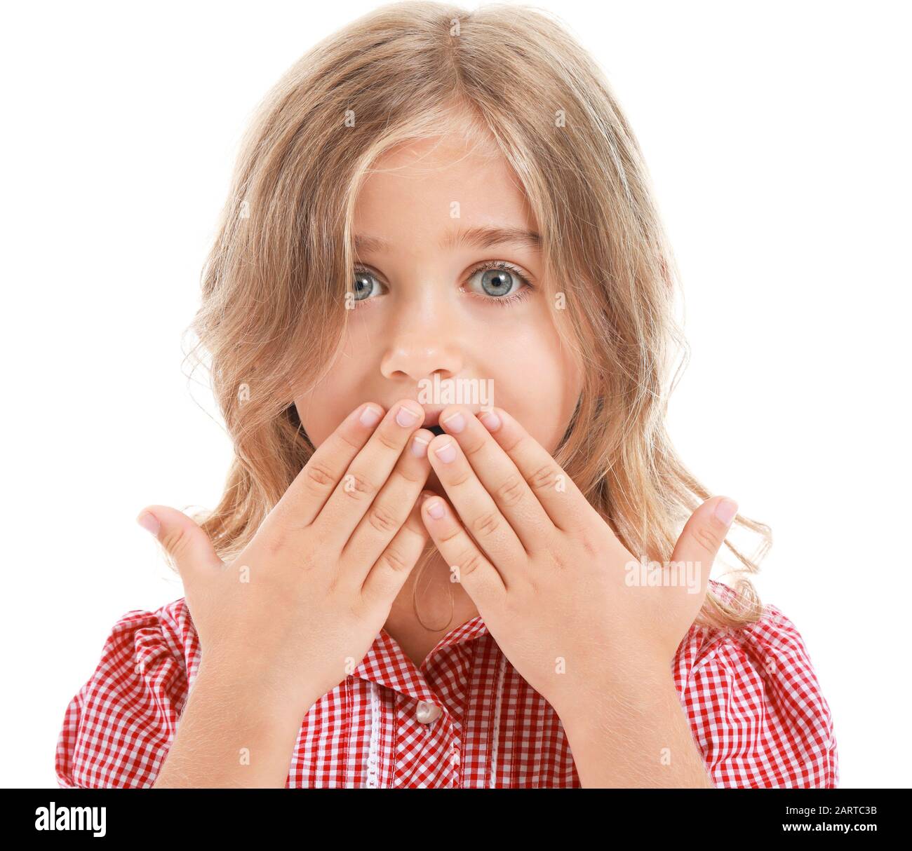 Surprised little girl on white background Stock Photo - Alamy