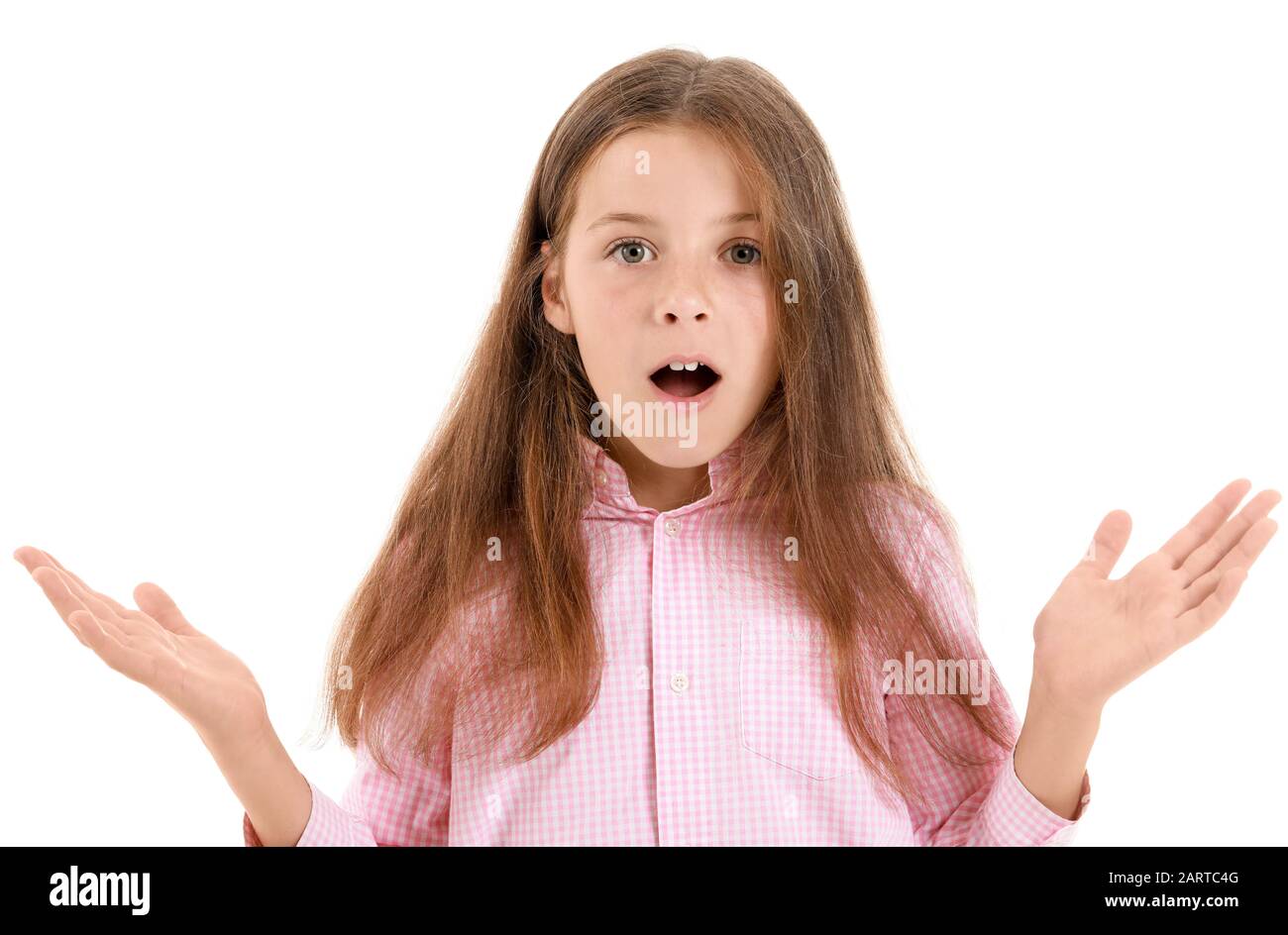 Surprised little girl on white background Stock Photo - Alamy