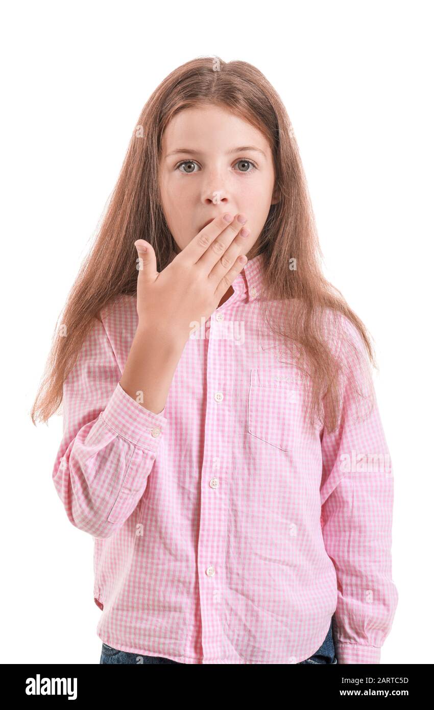 Surprised little girl on white background Stock Photo - Alamy
