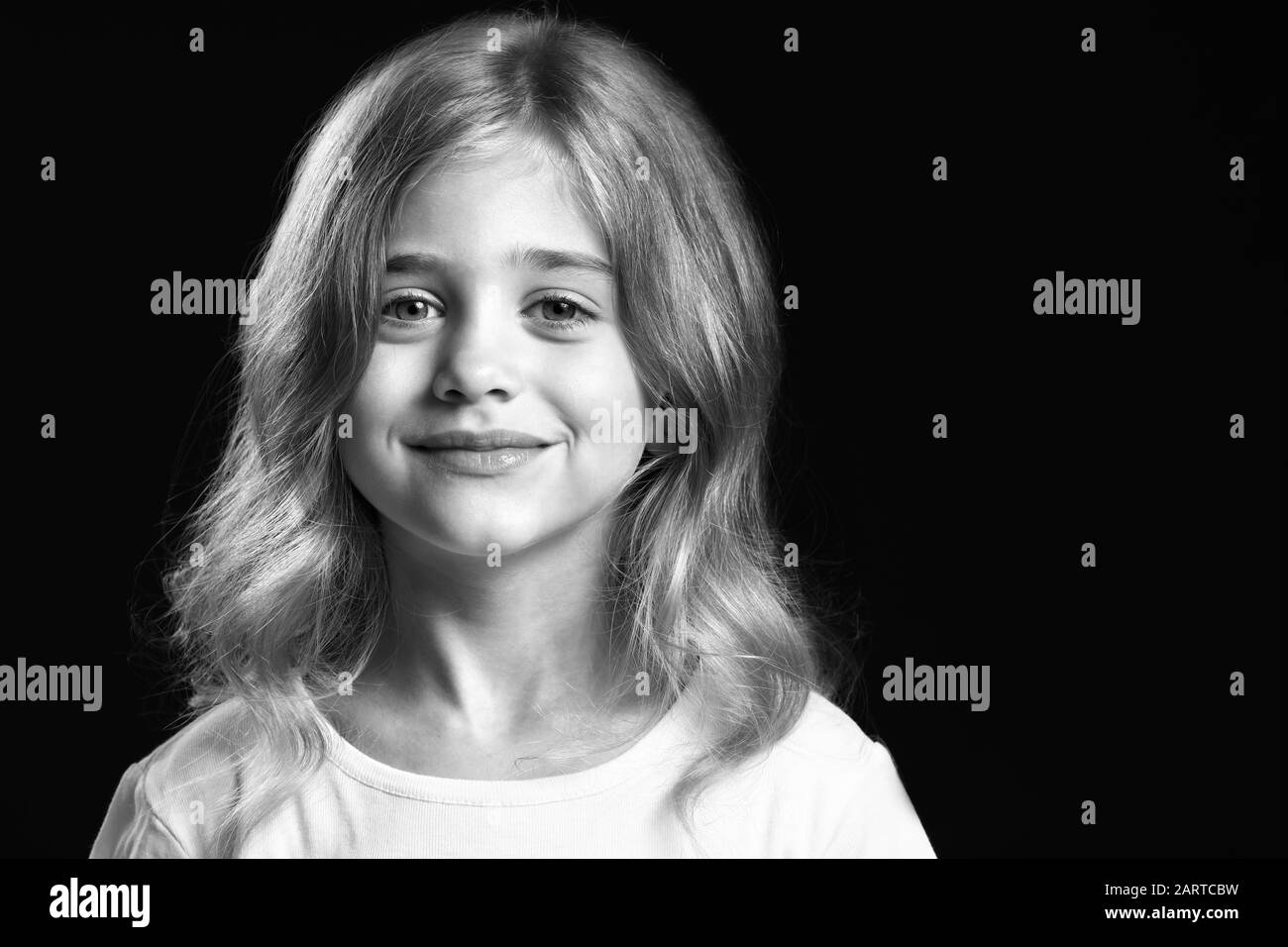 Black and white portrait of cute little girl on dark background Stock ...
