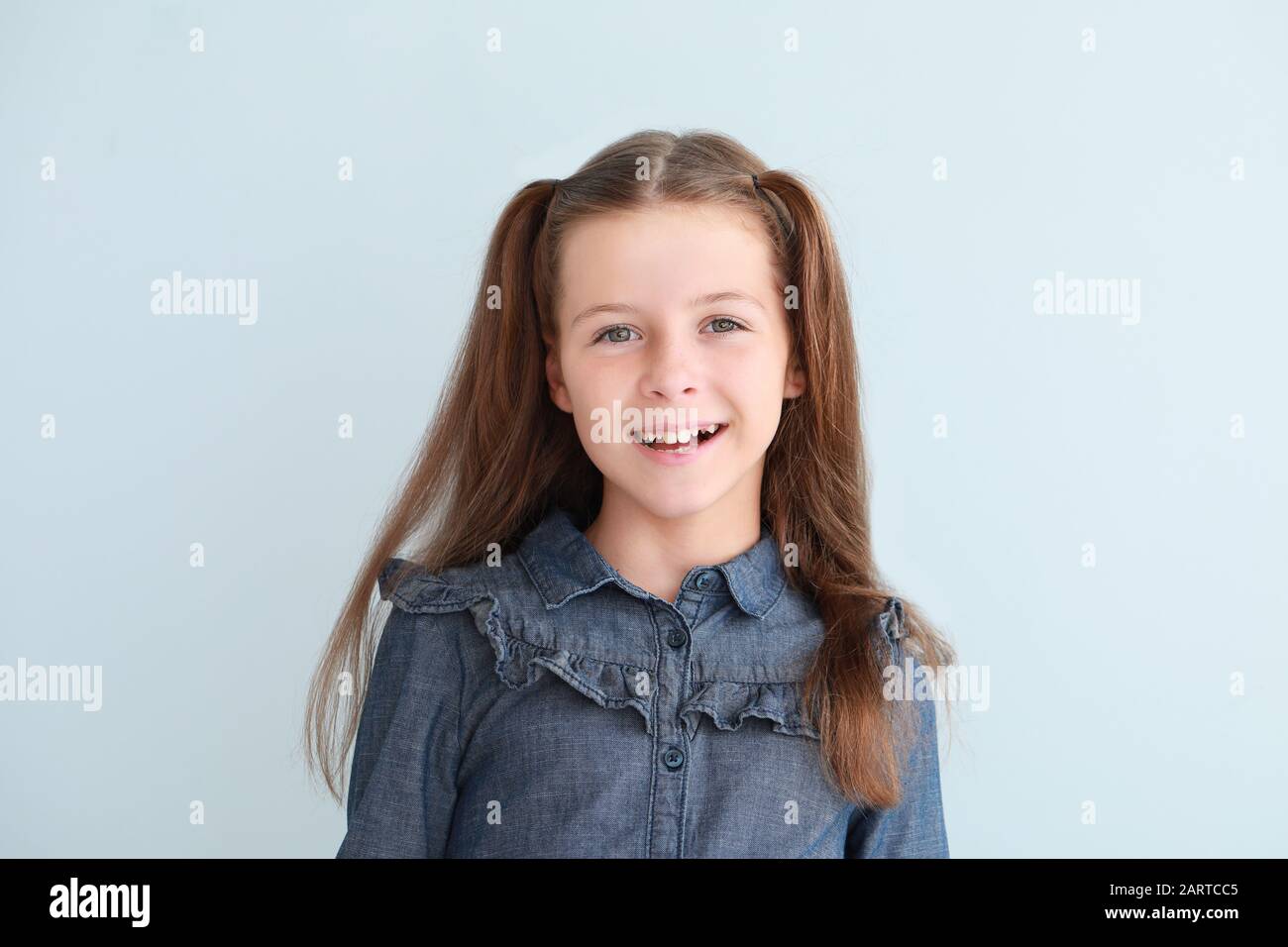 Cute Little Girl On Light Background Stock Photo Alamy cute-little-girl-on-light-background-stock-photo-alamy
