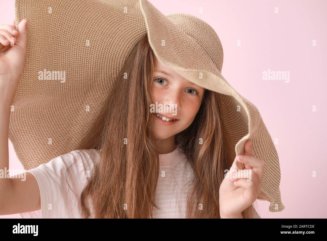 Girl With Big Hat High Resolution Stock Photography and Images - Alamy