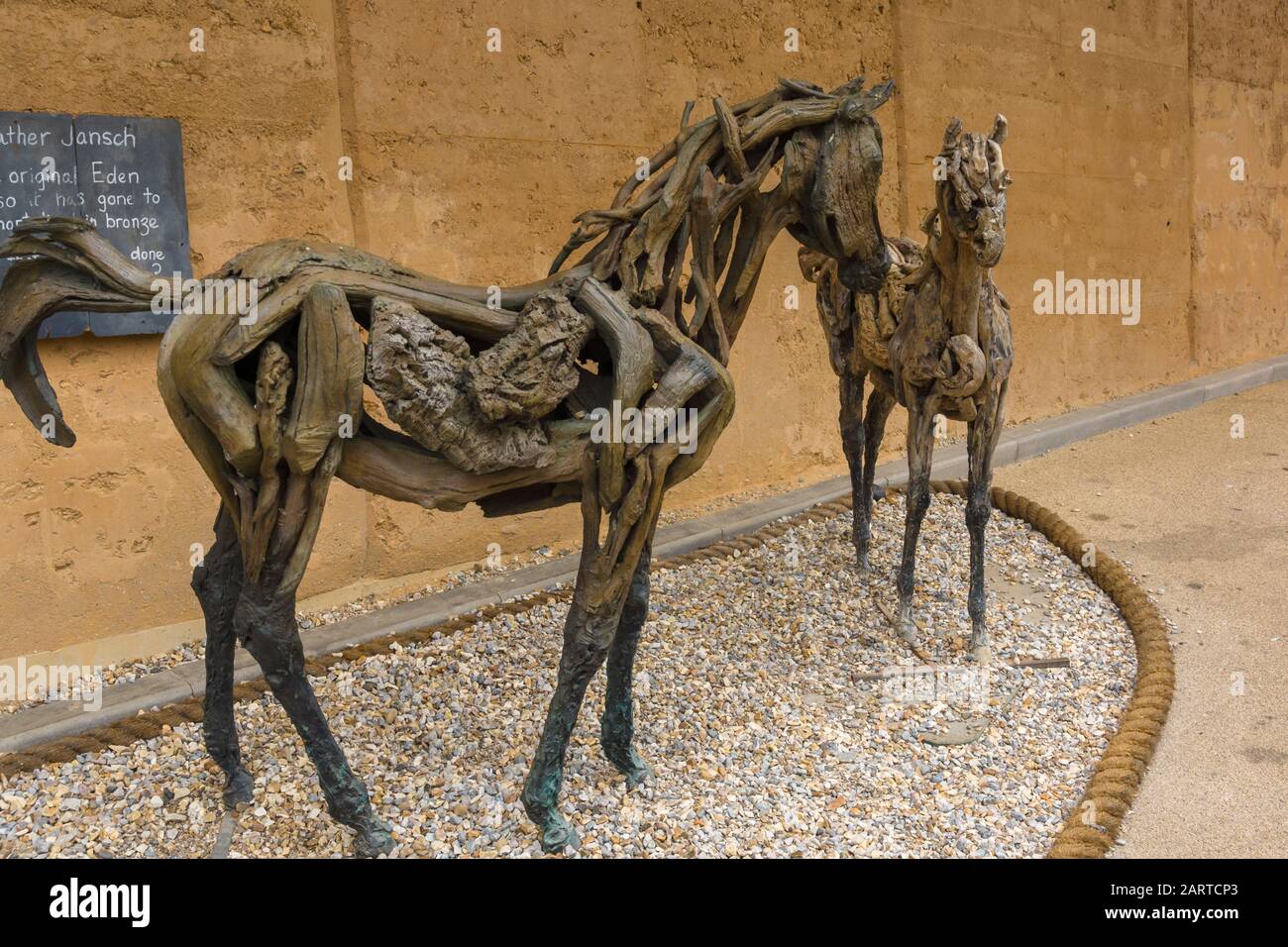 Bronze and Driftwood horses sculpture made by the artist Heather Jansch