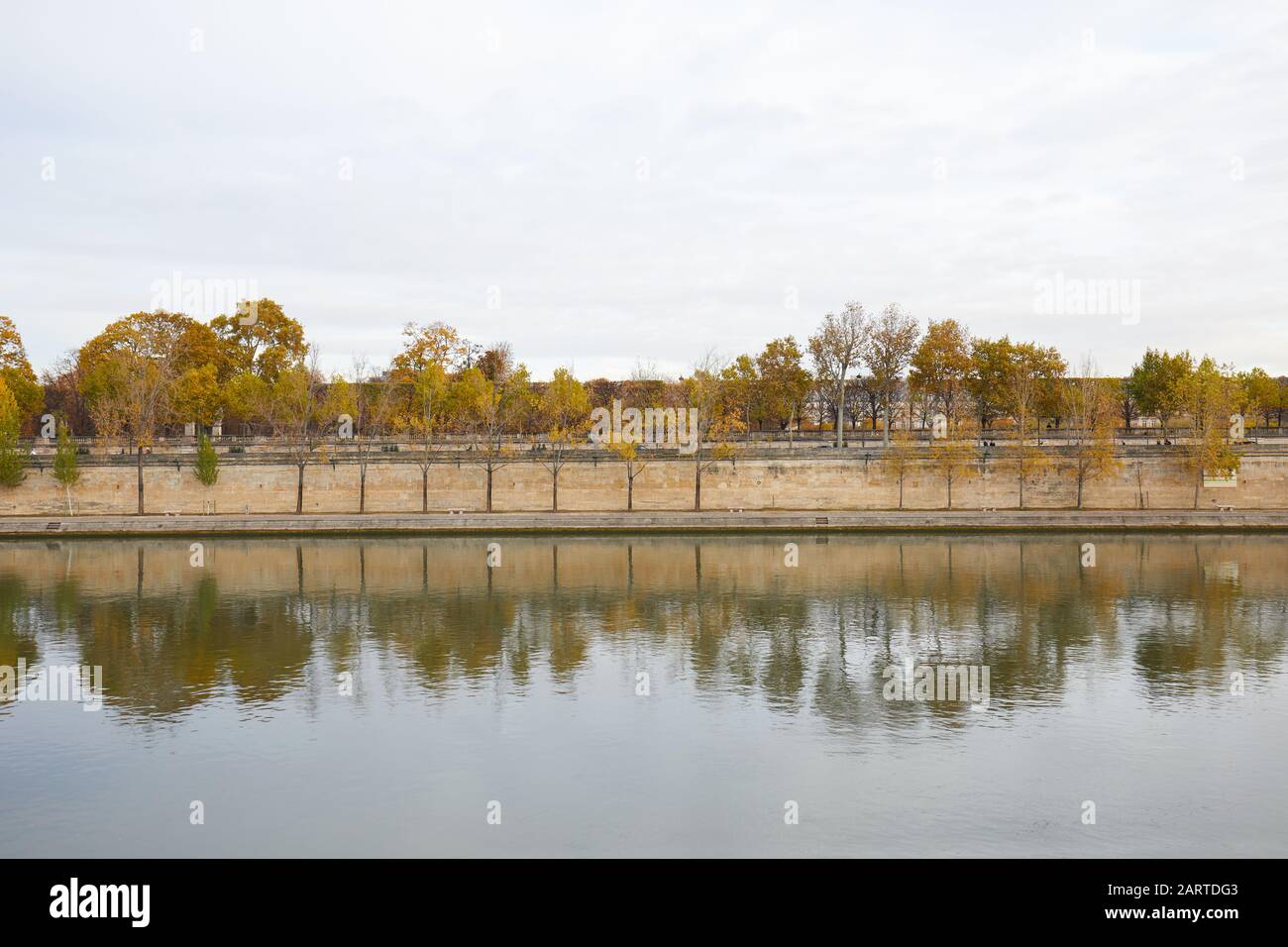 Seine river riverside in a cloudy autumn day in Paris, France Stock Photo