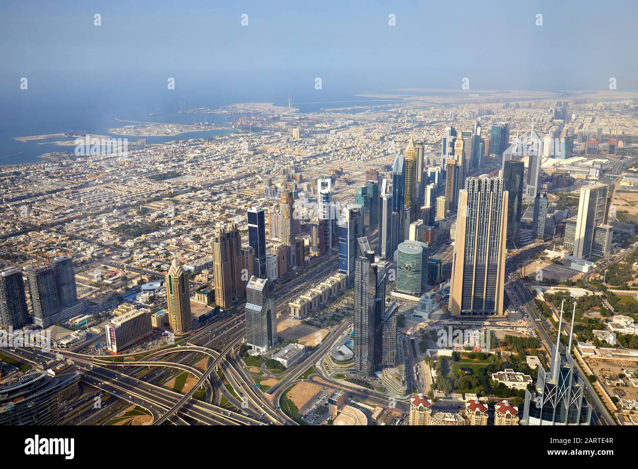 DUBAI, UNITED ARAB EMIRATES - NOVEMBER 19, 2019: Sheikh Zayed Road and Dubai city aerial view with modern skyscrapers in a sunny day, blue sky Stock Photo