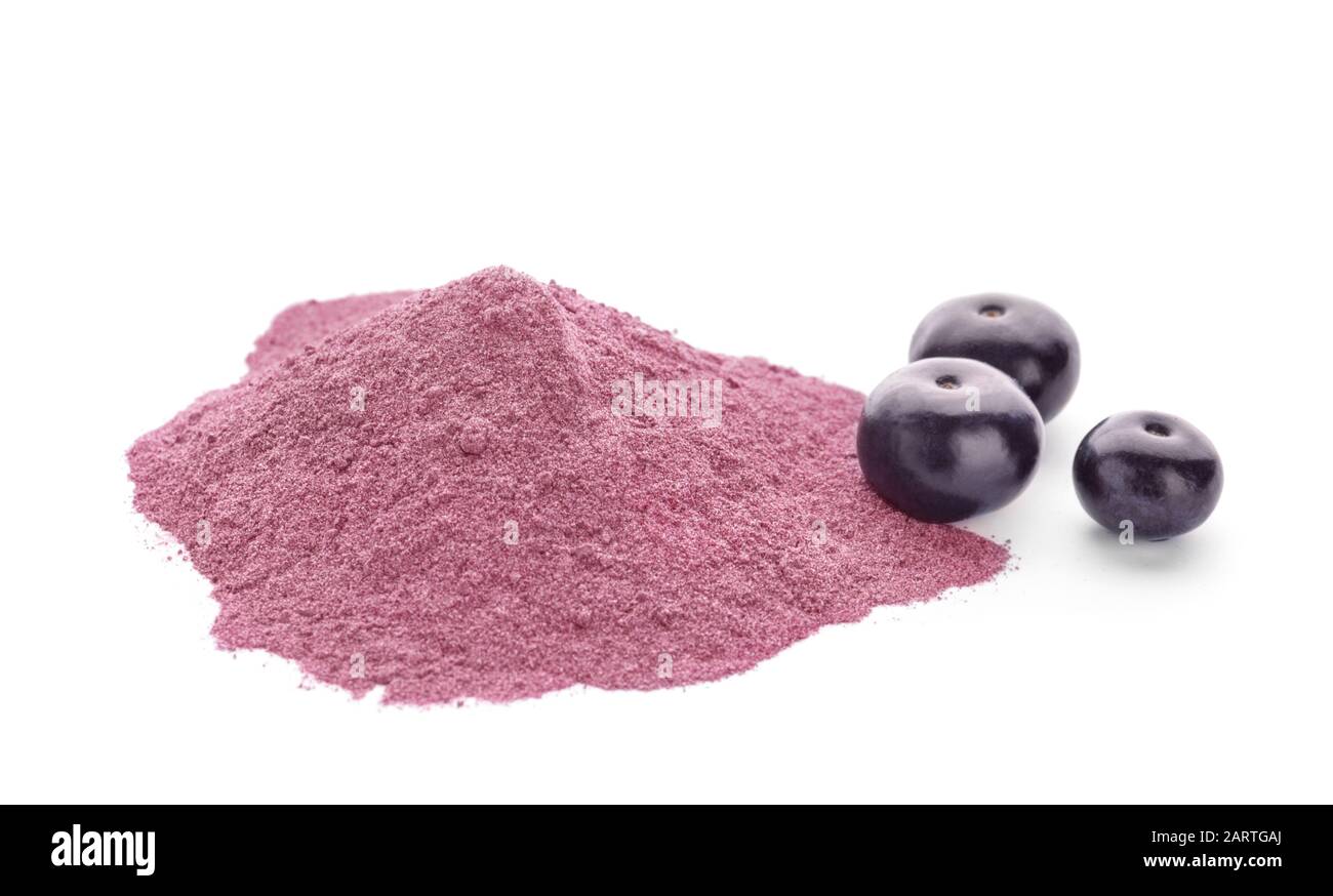 Powder with acai berries on white background Stock Photo - Alamy