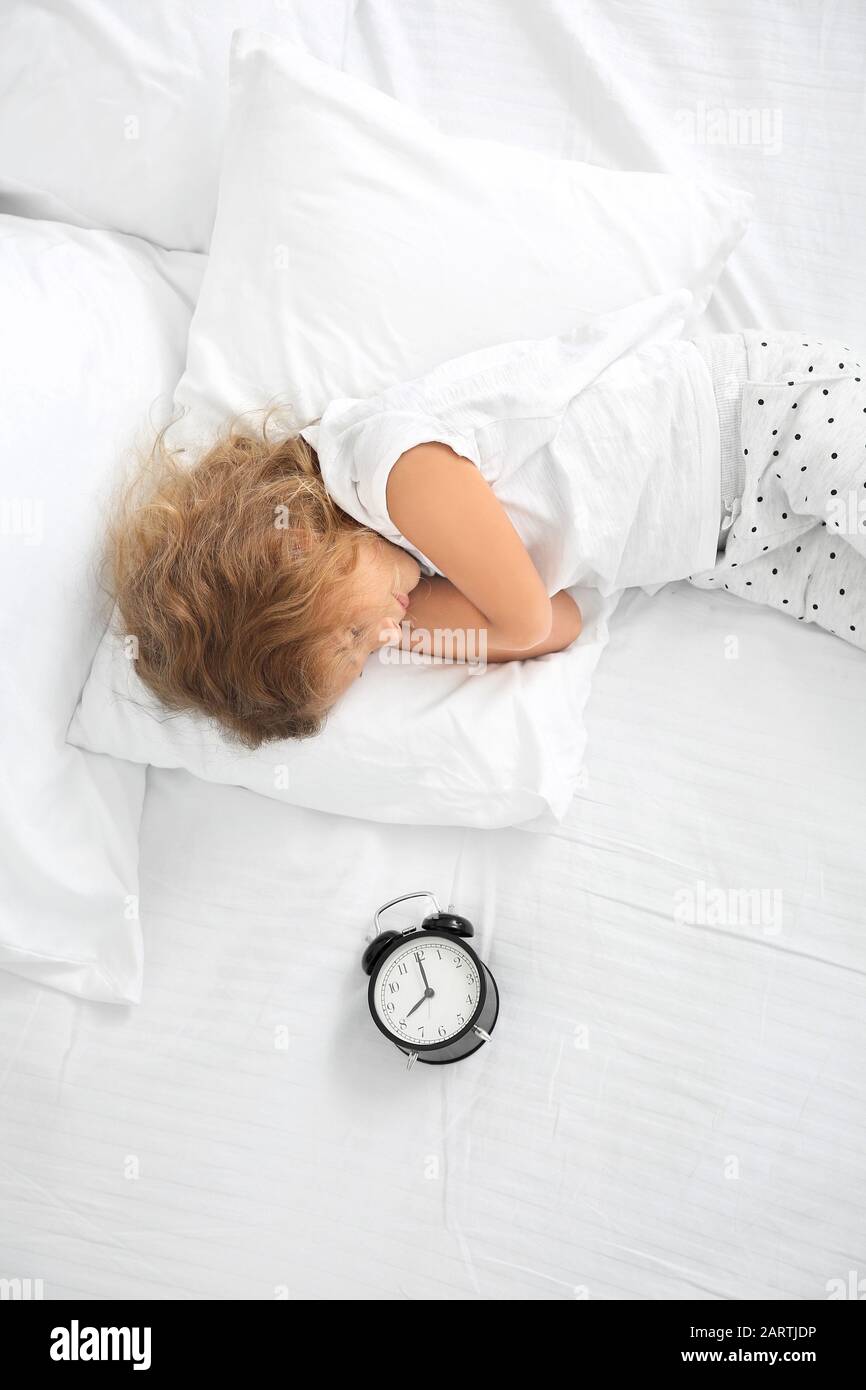 Cute little girl sleeping in bed Stock Photo Alamy