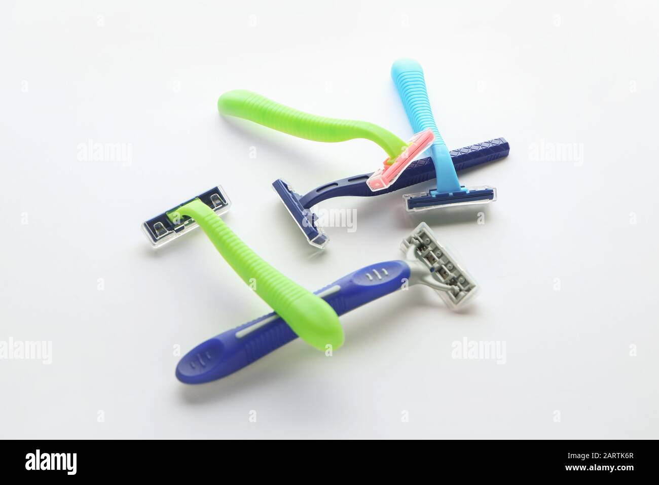 Razors for hair removal on white background Stock Photo - Alamy