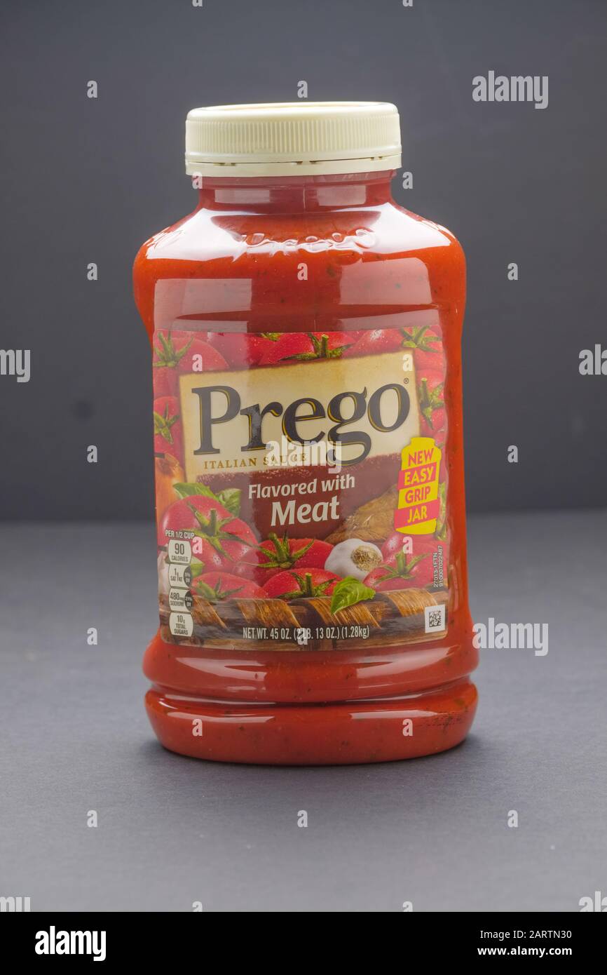 Plastic bottle of Prego spaghetti sauce on dark background Stock Photo