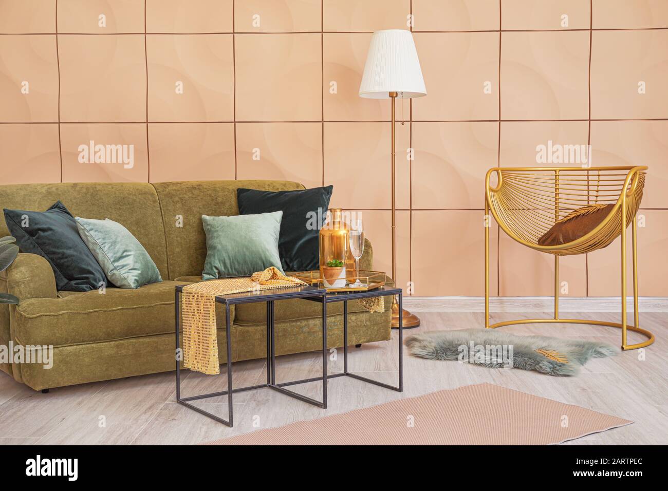 Stylish interior of living room with comfortable sofa Stock Photo - Alamy