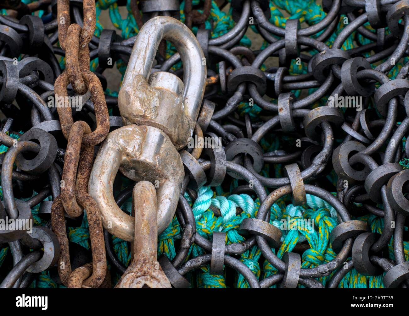 Close up of a fish and oyster dredging net and chain Stock Photo
