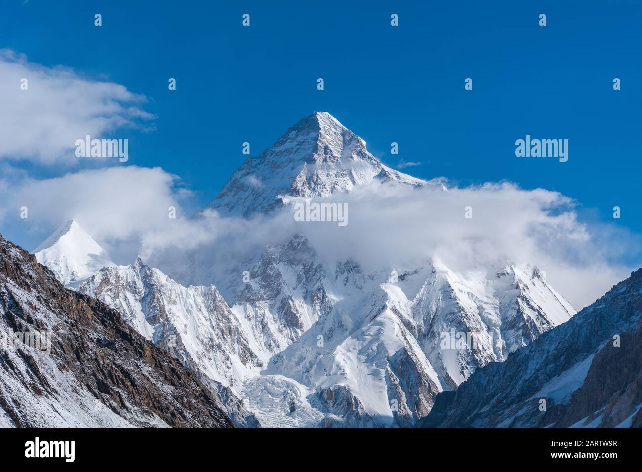 Close up view of K2, the second highest mountain in the world with Angel peak and Nera peak on the left side from Concordia, Pakistan Stock Photo